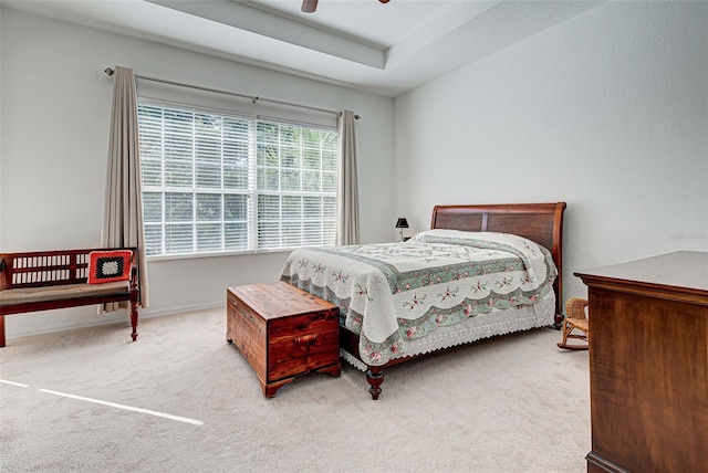 bedroom with light colored carpet and ceiling fan