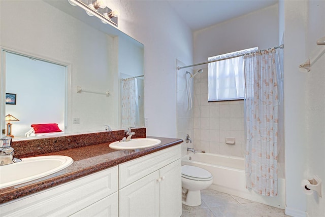 full bathroom featuring vanity, toilet, tile patterned floors, and shower / bathtub combination with curtain