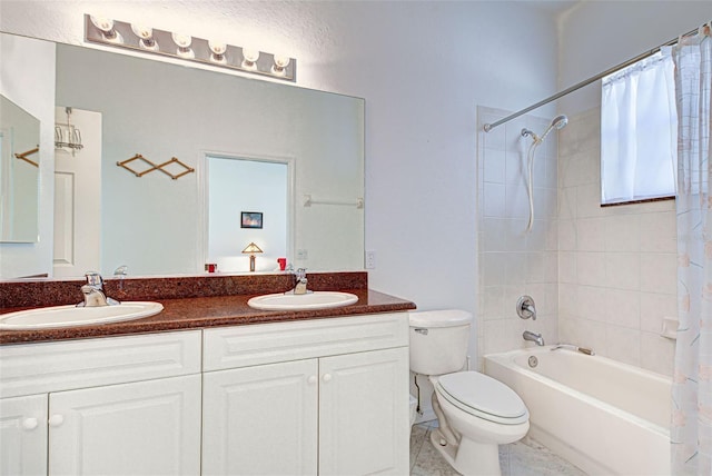 full bathroom featuring vanity, toilet, and shower / bath combination with curtain