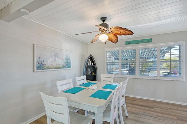 dining room with light wood-type flooring and ceiling fan