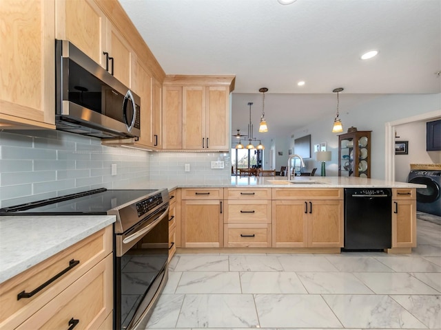 147 Tampa Ave E Unit 202, Venice, FL 34285 - kitchen featuring appliances with stainless steel finishes, light brown cabinets, washer / dryer, a sink, and recessed lighting