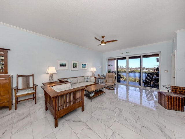 living room featuring ceiling fan and ornamental molding