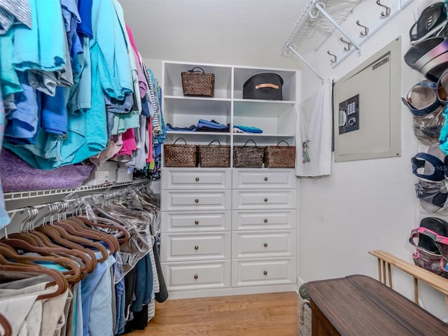 walk in closet featuring light hardwood / wood-style floors