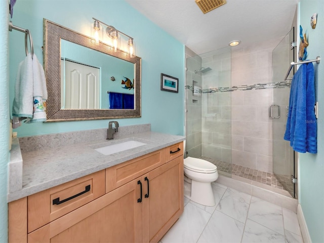 147 Tampa Ave E Unit 202, Venice, FL 34285 - bathroom featuring vanity, toilet, a shower stall, marble look tile flooring, and recessed lighting