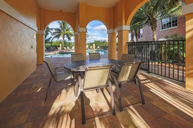 view of patio with a community pool