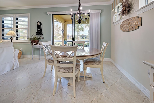 dining space featuring a chandelier and crown molding