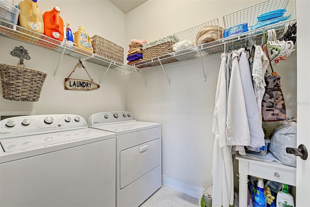 laundry room with separate washer and dryer