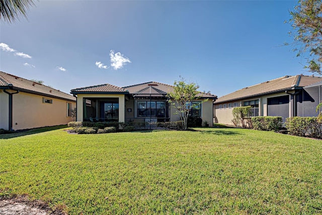 view of front facade with a front lawn