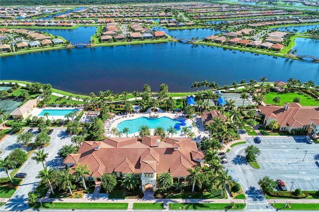 birds eye view of property featuring a water view