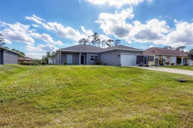 single story home with a garage and a front lawn