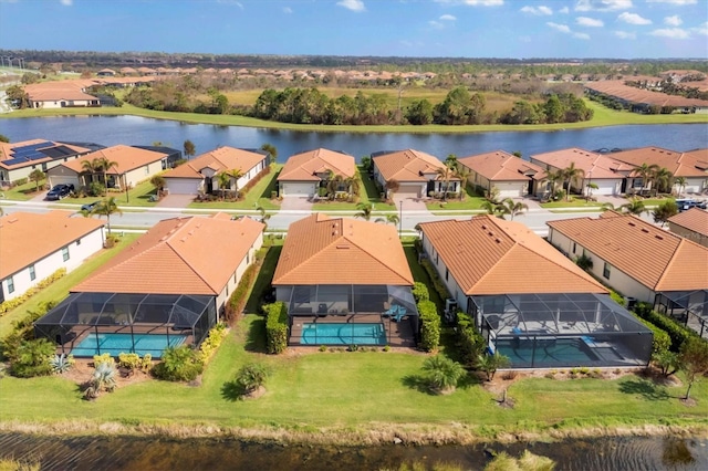 drone / aerial view featuring a water view