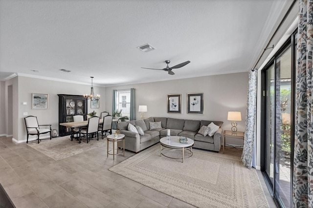 living room with ceiling fan with notable chandelier, a textured ceiling, and crown molding