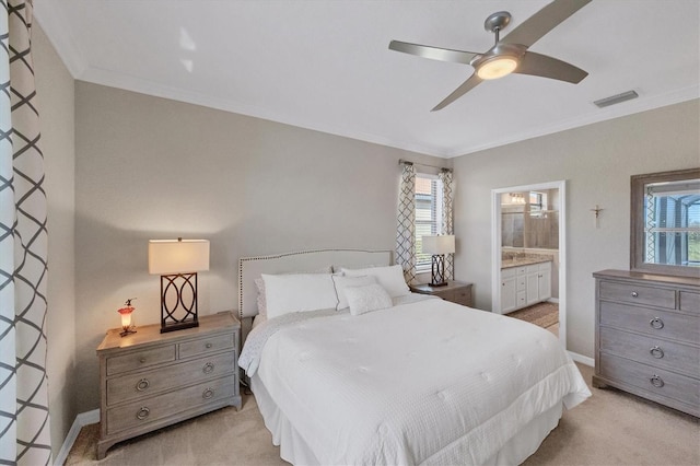 carpeted bedroom with ceiling fan, crown molding, and ensuite bathroom