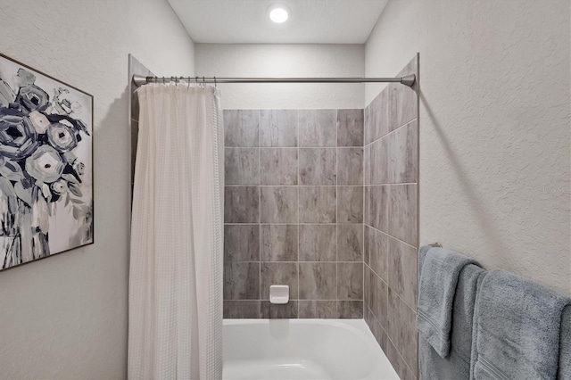 bathroom featuring shower / bath combination with curtain