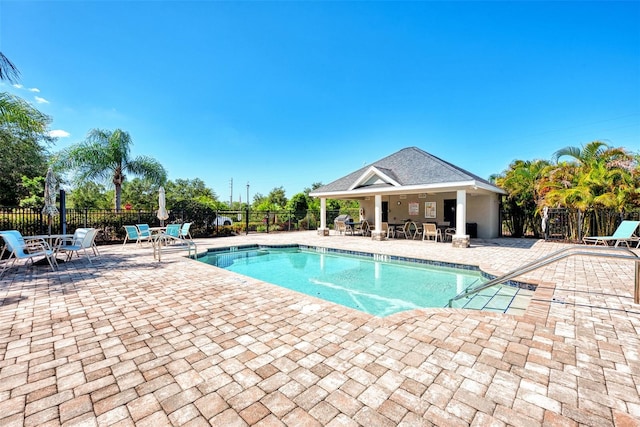 view of swimming pool featuring a patio