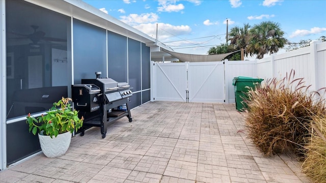 view of patio featuring a grill