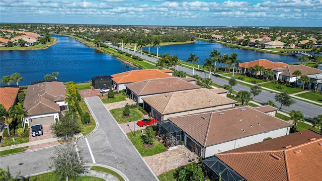 bird's eye view with a water view