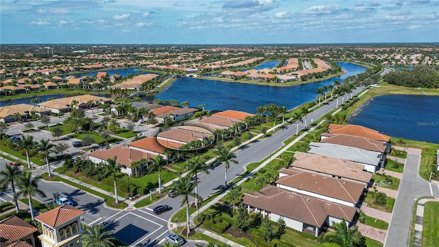 drone / aerial view with a water view