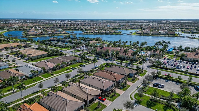 drone / aerial view with a water view