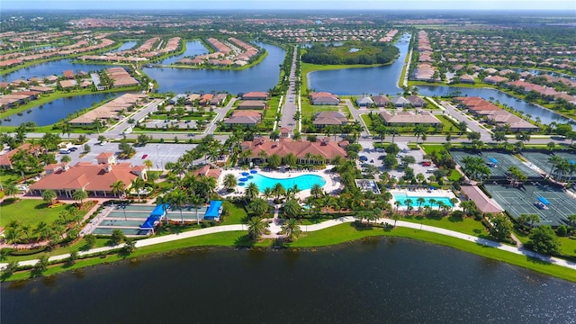 bird's eye view with a water view