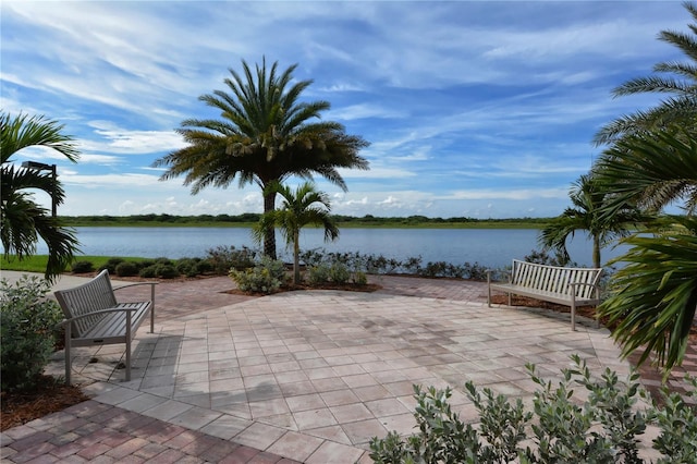 view of patio / terrace with a water view