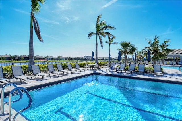 view of swimming pool with a patio area