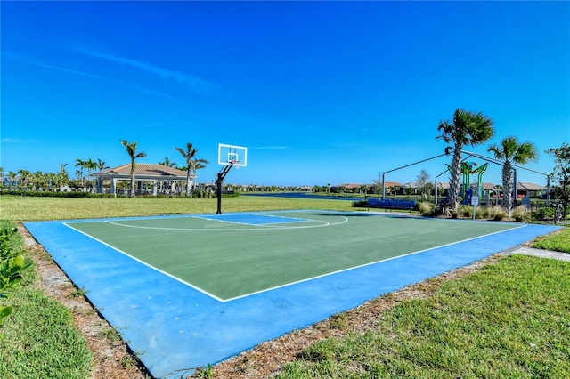 view of basketball court with a gazebo and a yard