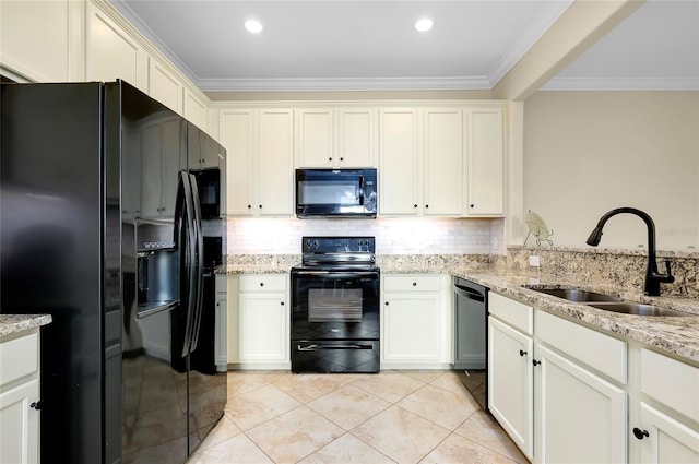 kitchen featuring decorative backsplash, sink, black appliances, and ornamental molding