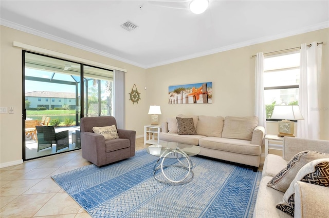 tiled living room with a wealth of natural light and crown molding