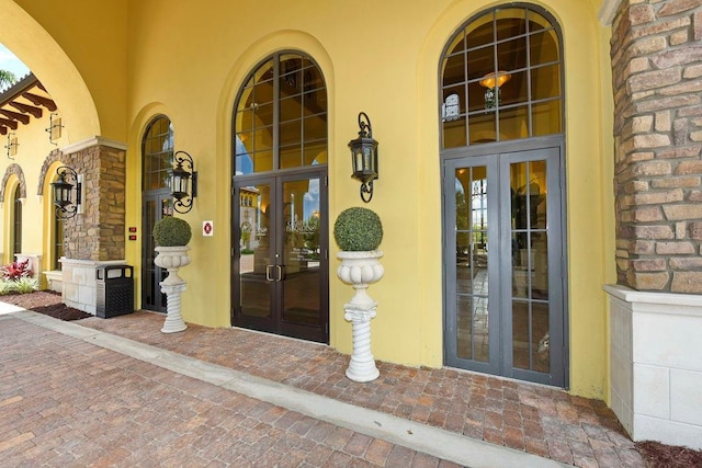 entrance to property featuring french doors