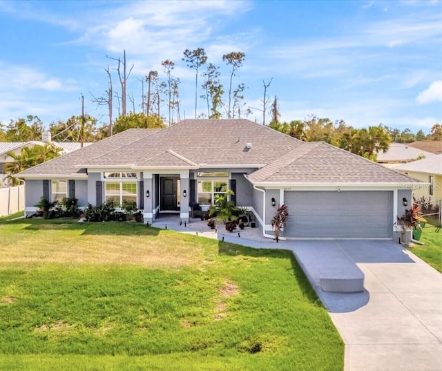 ranch-style house with a front lawn and a garage