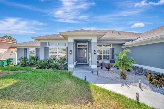 view of front of house with a front lawn