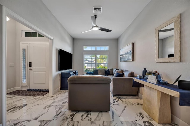 living room featuring ceiling fan