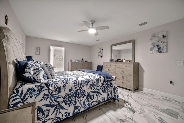 bedroom with ensuite bathroom and ceiling fan