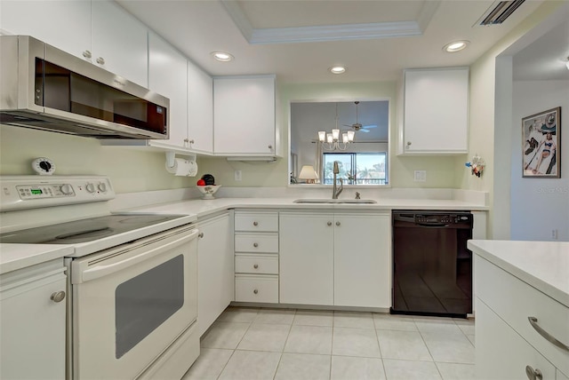 kitchen with dishwasher, white cabinetry, sink, and electric stove