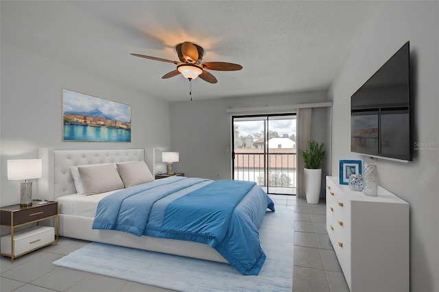 bedroom with light tile patterned floors, a textured ceiling, access to outside, and ceiling fan