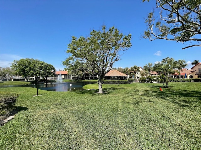 view of yard with a water view