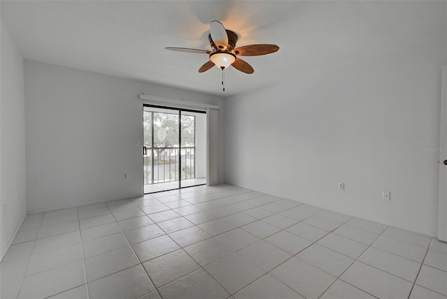 unfurnished room with light tile patterned flooring and ceiling fan