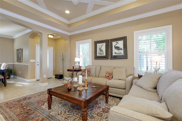 tiled living room featuring crown molding and plenty of natural light