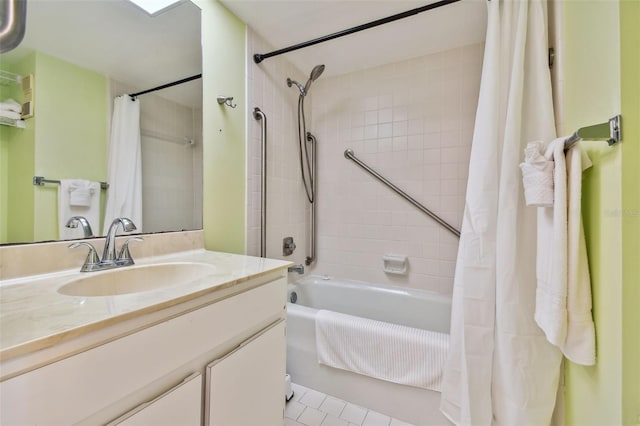 bathroom with tile patterned floors, vanity, and shower / tub combo with curtain