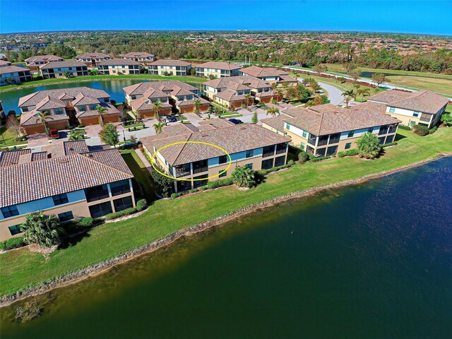 20190 Ragazza Cir Unit 202, Venice, FL 34293 - aerial perspective of suburban area with a large body of water