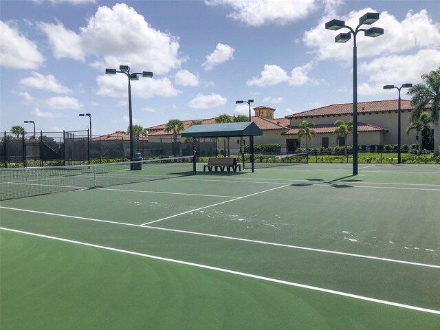 20190 Ragazza Cir Unit 202, Venice, FL 34293 - view of tennis court featuring fence