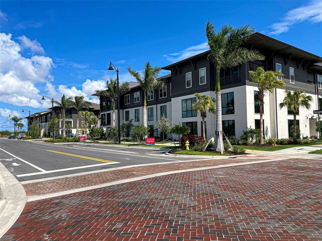 20190 Ragazza Cir Unit 202, Venice, FL 34293 - view of building exterior featuring a residential view