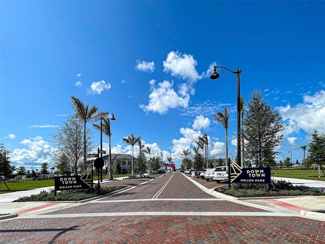 20190 Ragazza Cir Unit 202, Venice, FL 34293 - view of decorative road with street lights, curbs, and sidewalks