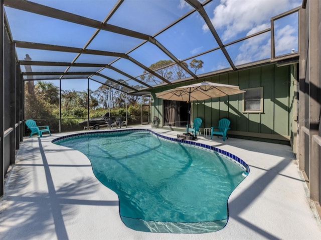 view of pool featuring a lanai and a patio area