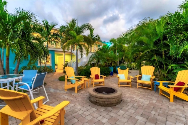 view of patio / terrace featuring an outdoor fire pit