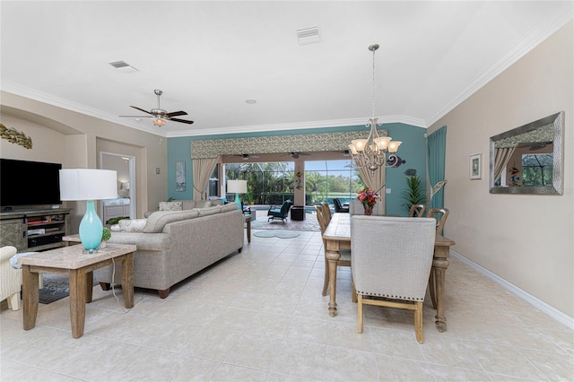 105 Treviso Ct, North Venice, FL 34275 - dining area with crown molding, a chandelier, light tile patterned flooring, a ceiling fan, and baseboards