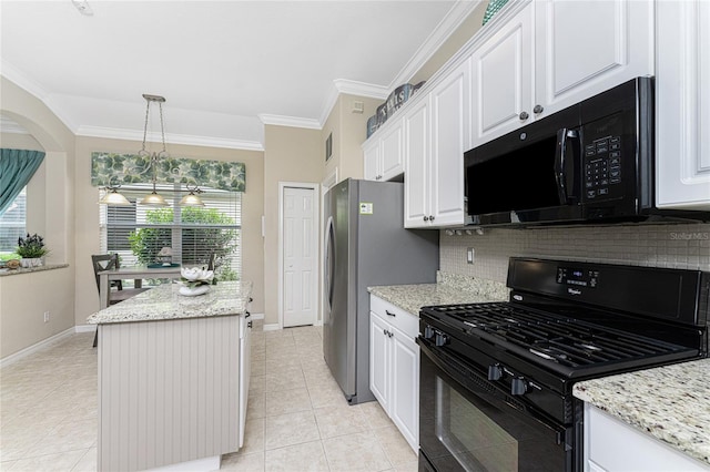 105 Treviso Ct, North Venice, FL 34275 - kitchen featuring black appliances, a kitchen island, crown molding, backsplash, and baseboards