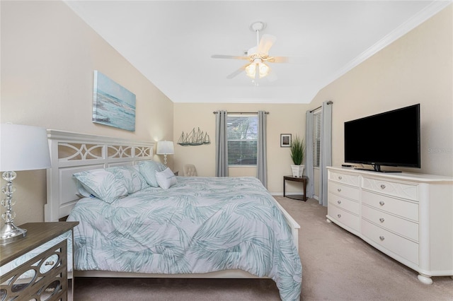 bedroom featuring ceiling fan, light colored carpet, and ornamental molding