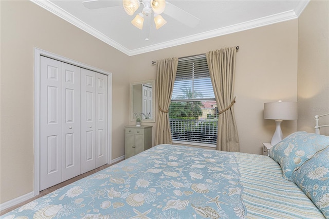 105 Treviso Ct, North Venice, FL 34275 - bedroom with ornamental molding, a closet, baseboards, and a ceiling fan